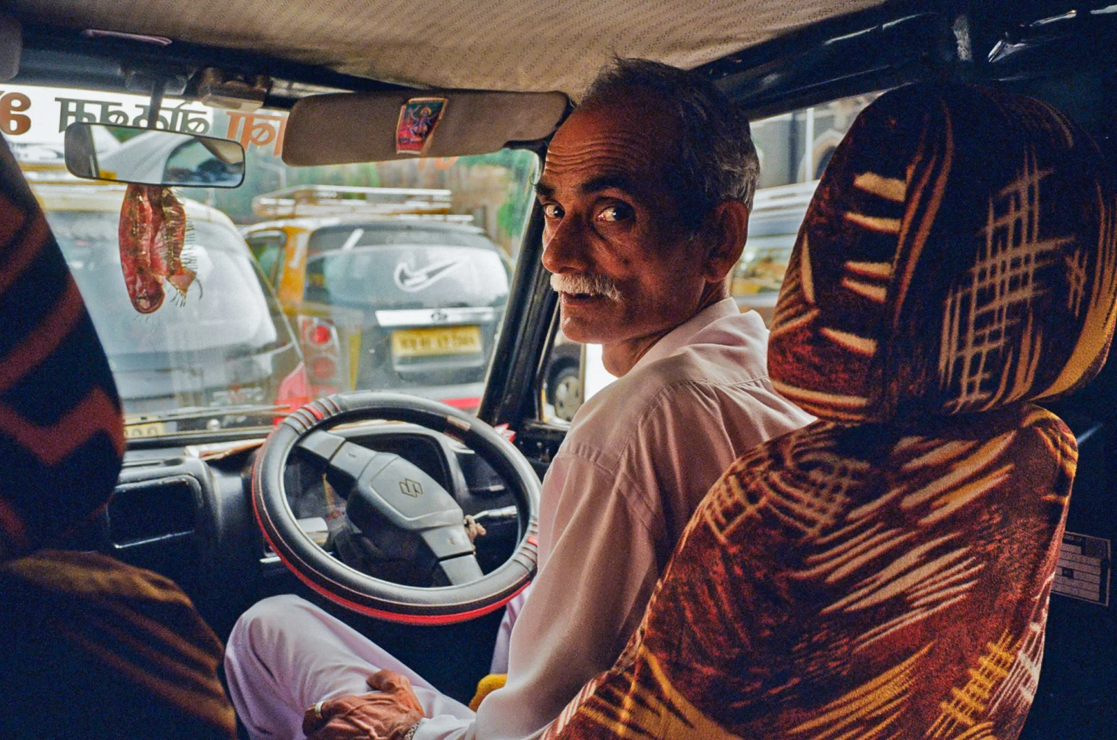 Travel scene — twilight cityscape reflected in calm water
