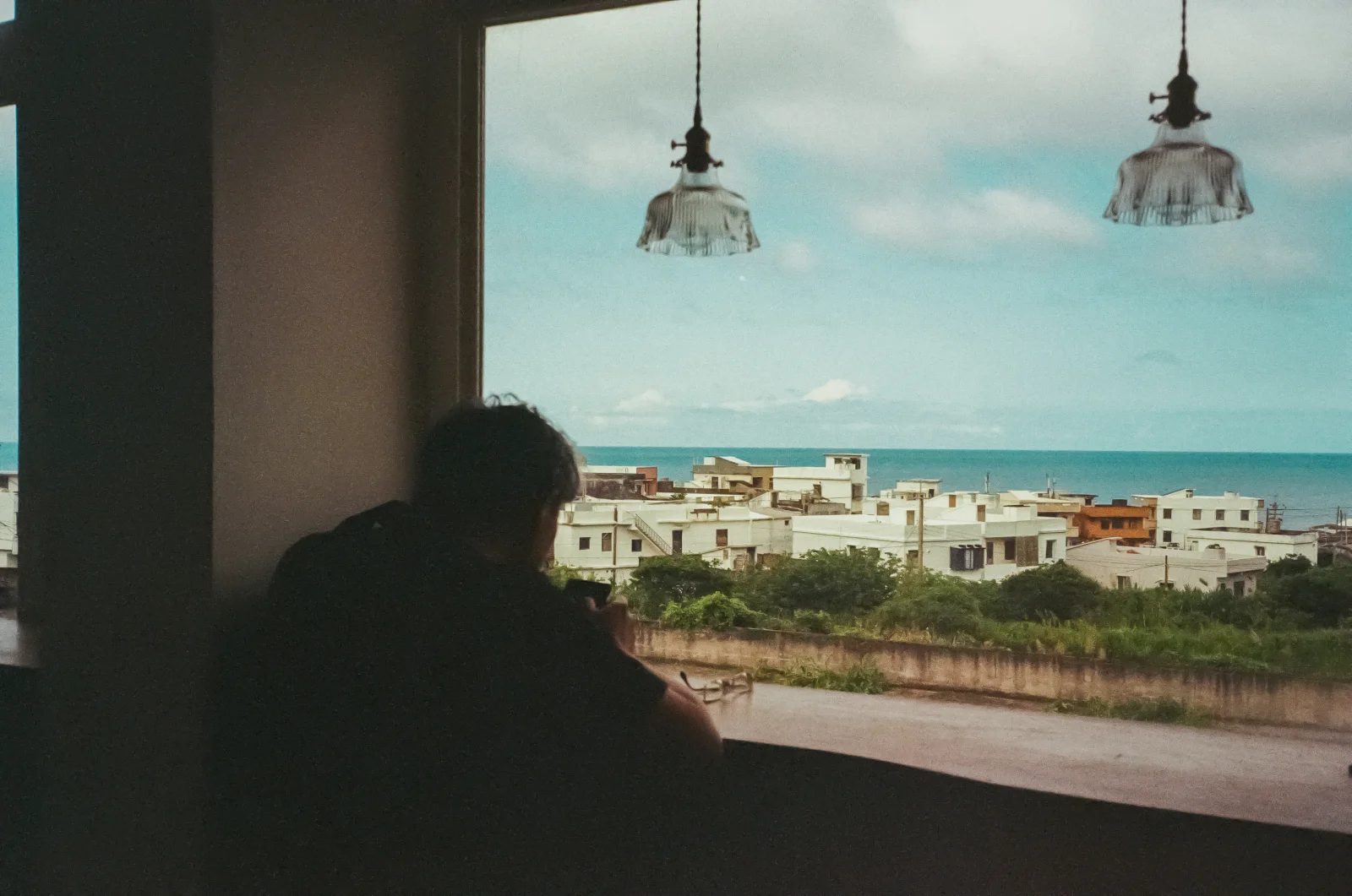 Travel scene — narrow alleyway decorated with lanterns